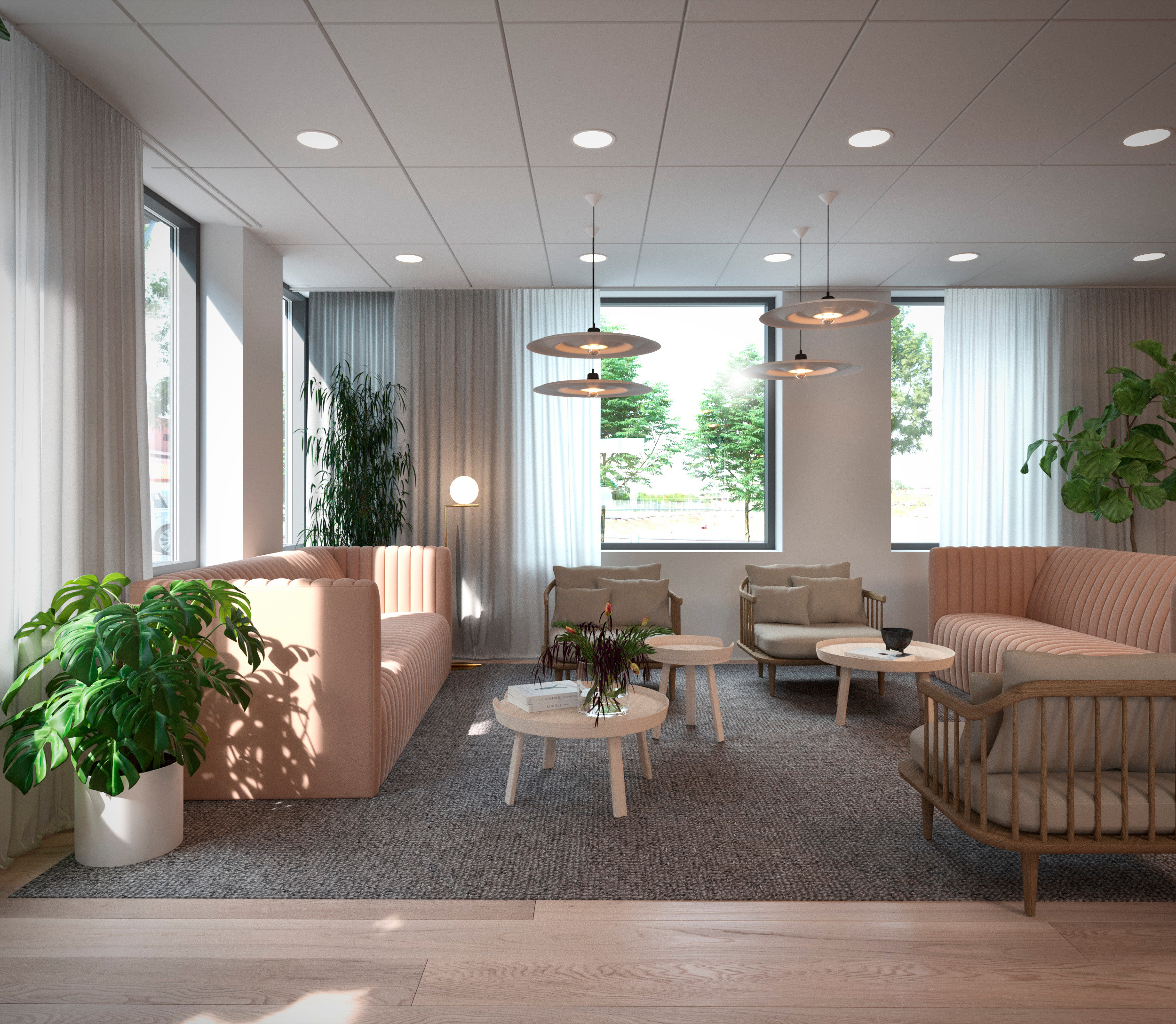 Meeting lounge with sofas and large windows.